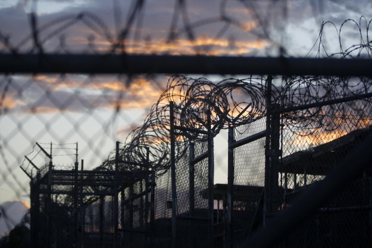 Dawn arrives in 2013 at the now-closed Camp X-Ray at the Guantanamo Bay Naval Base, Cuba.