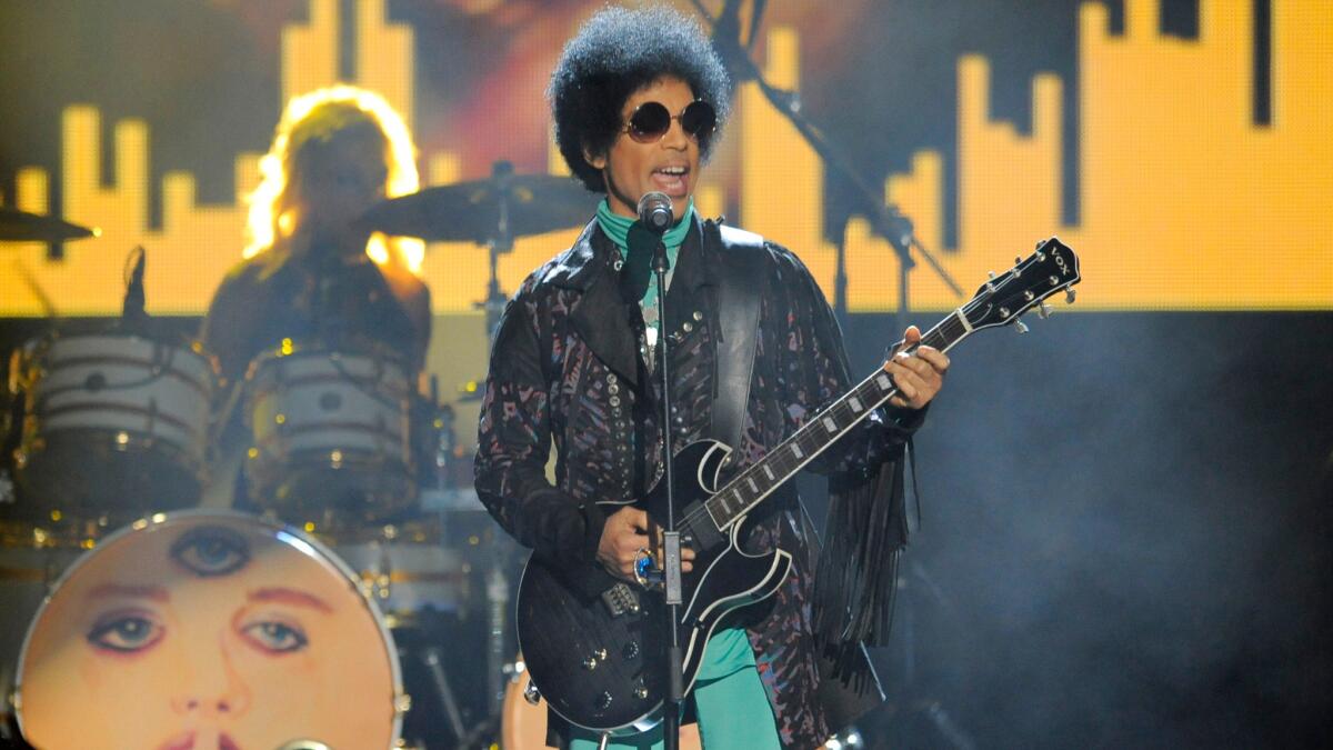 Prince performs at the 2013 Billboard Music Awards at the MGM Grand Garden Arena in Las Vegas.