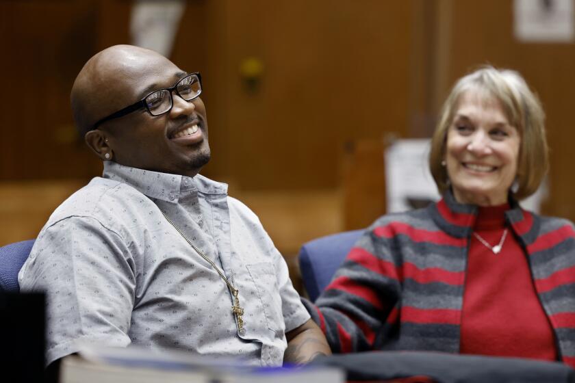 LOS ANGELES-CA-FEBRUARY 27, 2024: Jofama Coleman, who served 18 years in prison for a crime he didn't commit, is exonerated at Clara Shortridge Foltz Criminal Justice Center in downtown Los Angeles with his attorney Ellen Eggers by his side on February 27, 2024. (Christina House / Los Angeles Times)