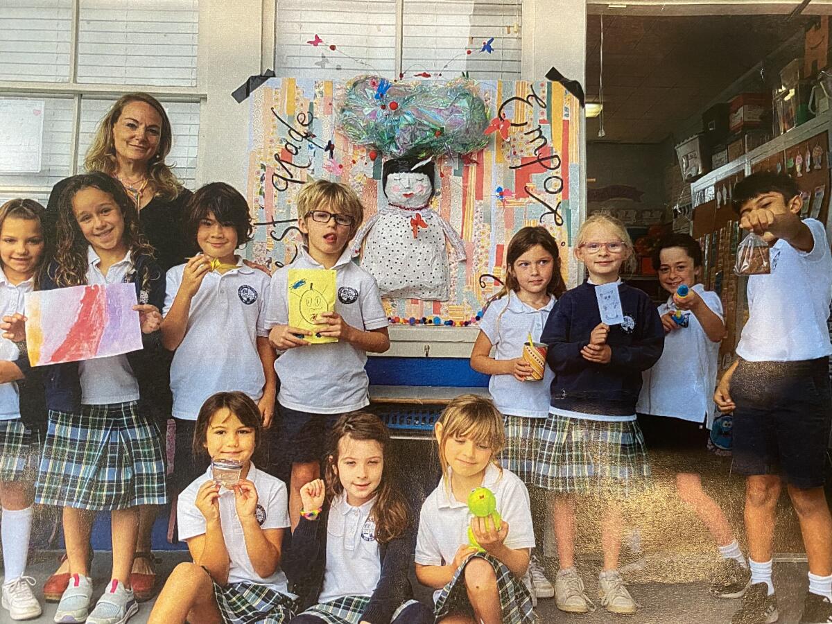 Students in Betsy Whitten's first-grade class at Stella Maris Academy donated $193 to the La Jolla/Riford Library.