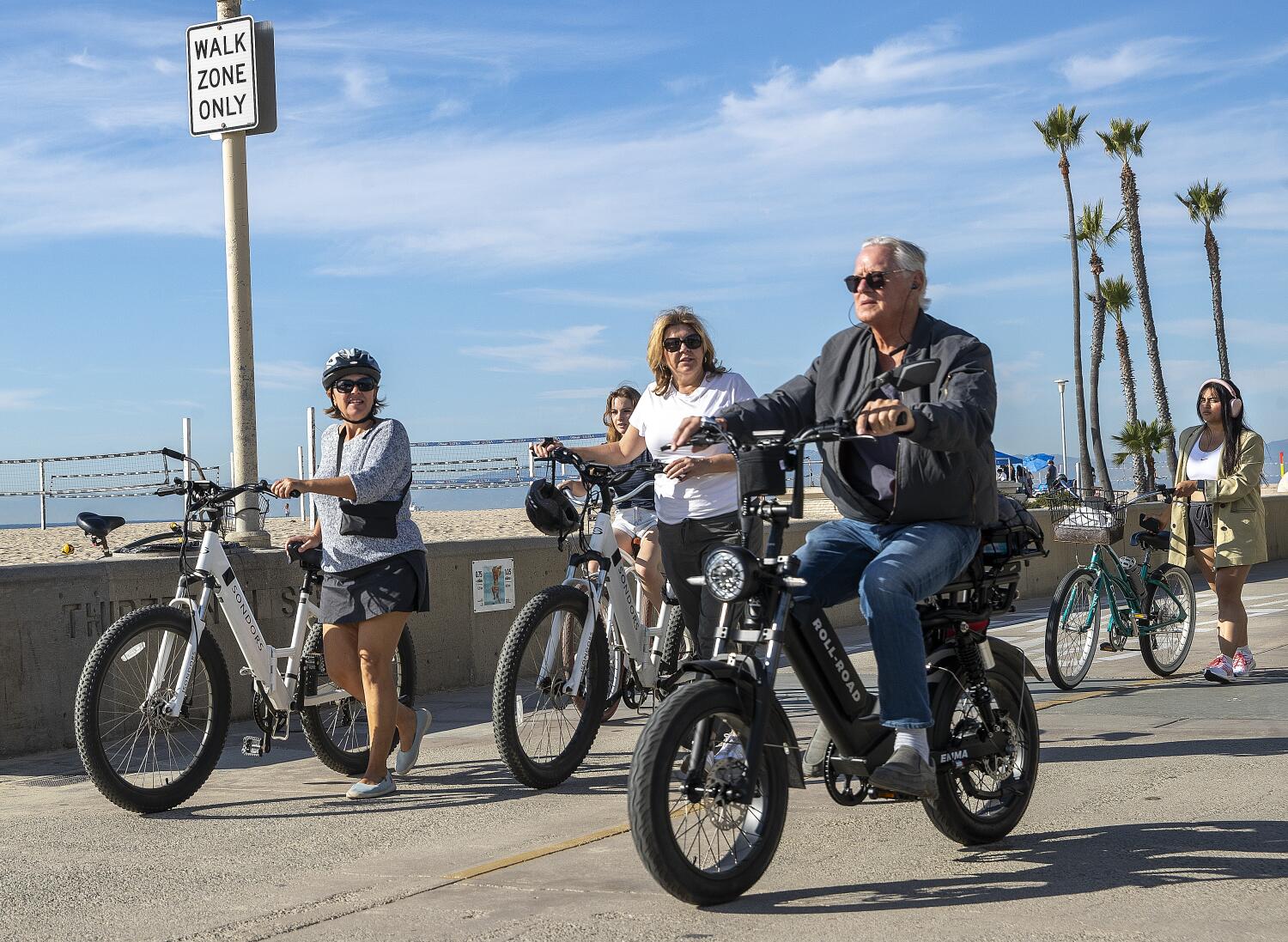 In the South Bay, e-bikes are restricted along the beach. Yet they're still everywhere