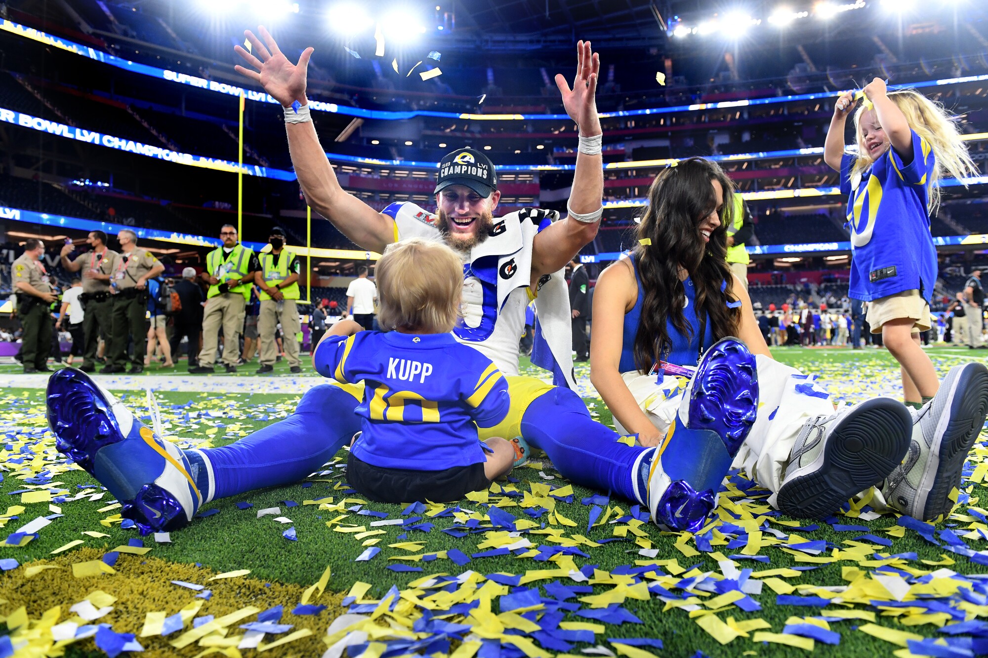 Los Angeles Rams wide receiver Cooper Kupp (10) celebrates with his family