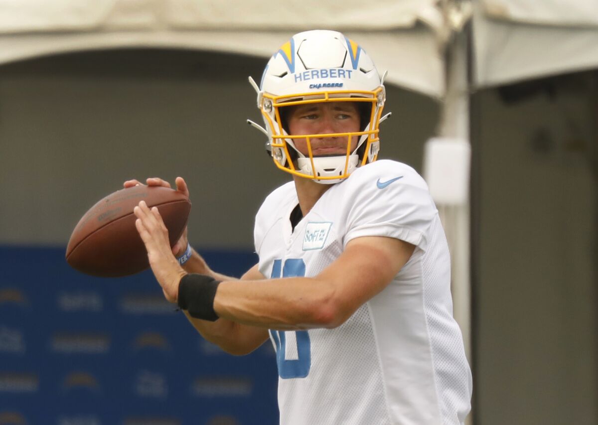 Chargers quarterback Justin Herbert prepares to throw during a practice.