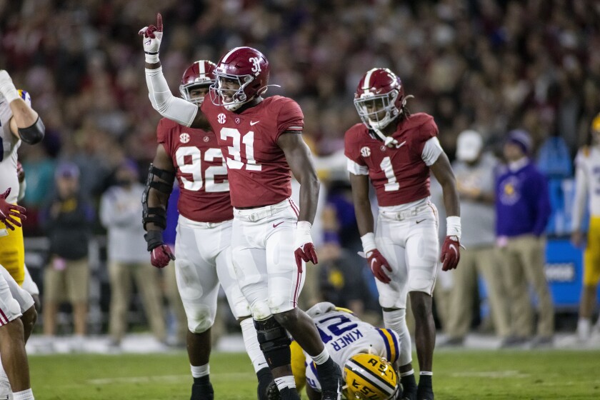 Alabama linebacker Will Anderson Jr. (31) celebrates a defensive stop against LSU during the first half of an NCAA college football game, Saturday, Nov. 6, 2021, in Tuscaloosa, Ala. (AP Photo/Vasha Hunt)