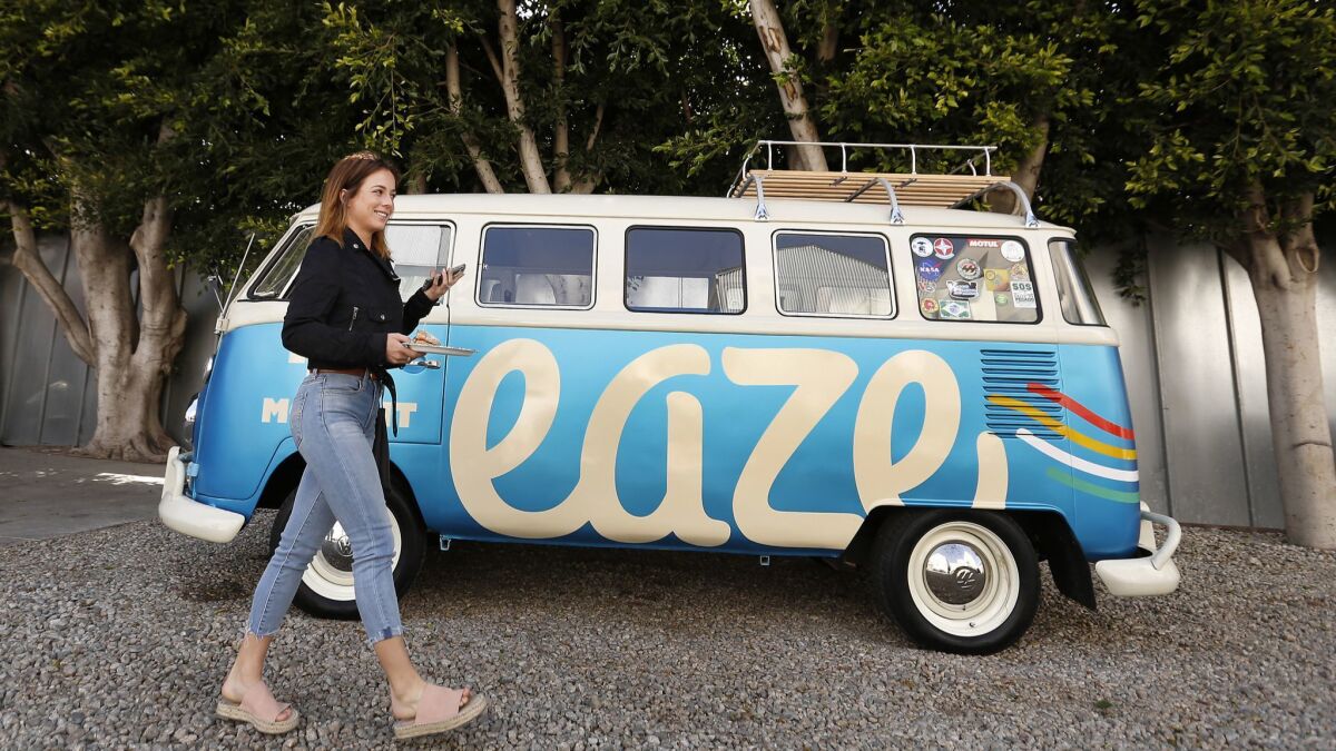 Acacia Friedman takes a break from the "Dawn of Cannabis" event at EAZE L.A. headquarters in Venice on April 18, 2018. EAZE is the state's biggest cannabis delivery business and has just expanded into Venice from San Francisco.