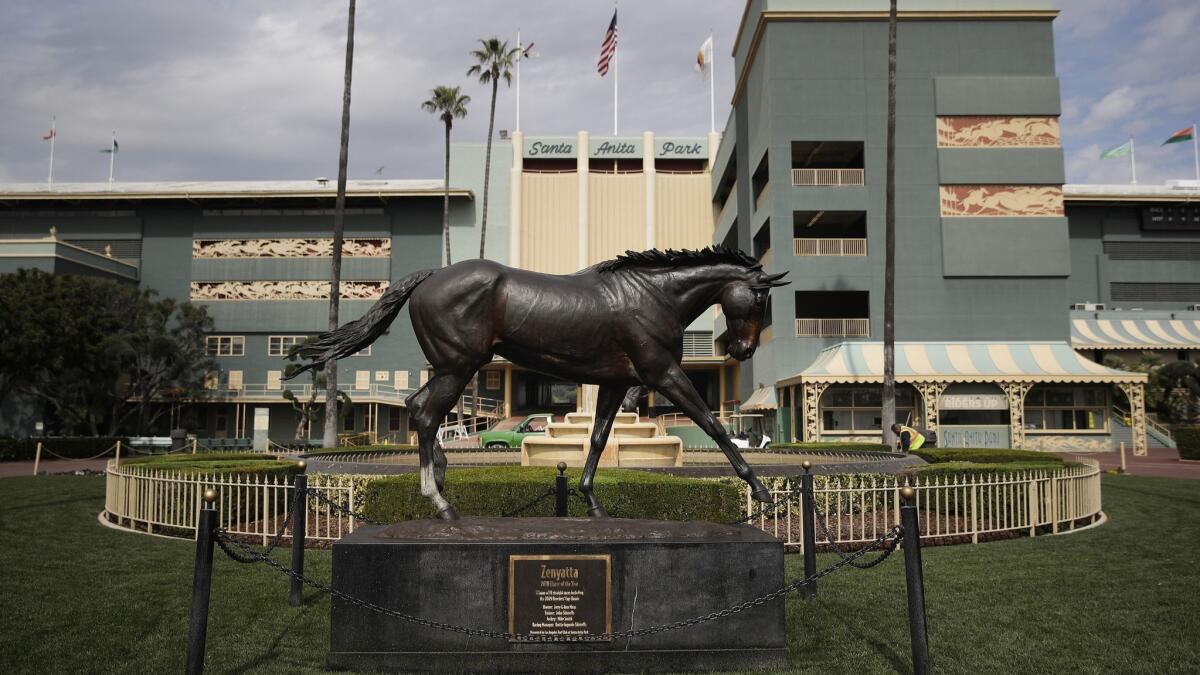 In this March 2019 photo, a statue of Zenyatta stands in the paddock gardens area at Santa Anita Park.