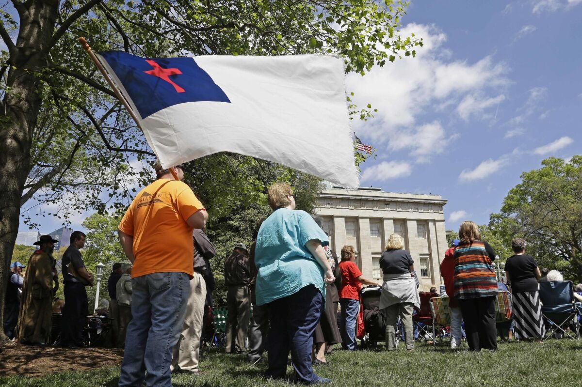 Supporters of a new state law gather on Monday for a rally outside the North Carolina State Capitol in Raleigh.