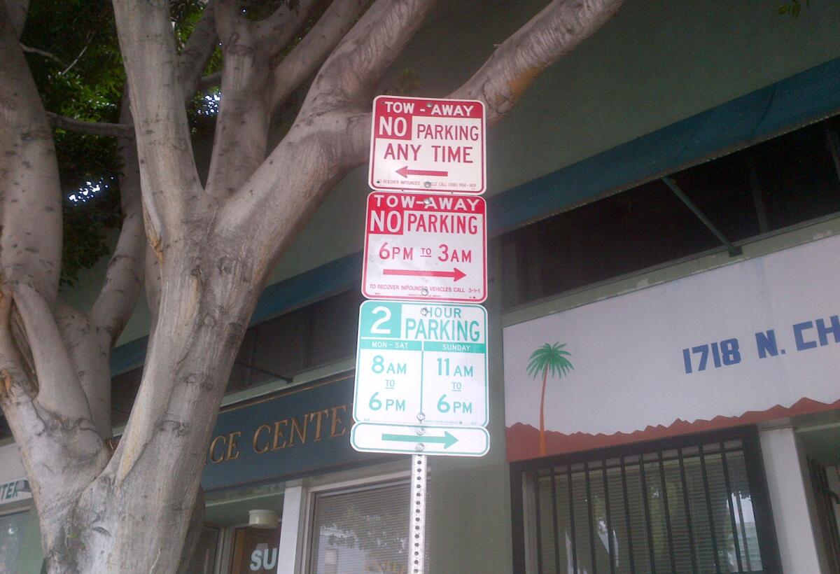 Confusing parking signs seen on Cherokee Avenue north of Hollywood Boulevard in 2013.