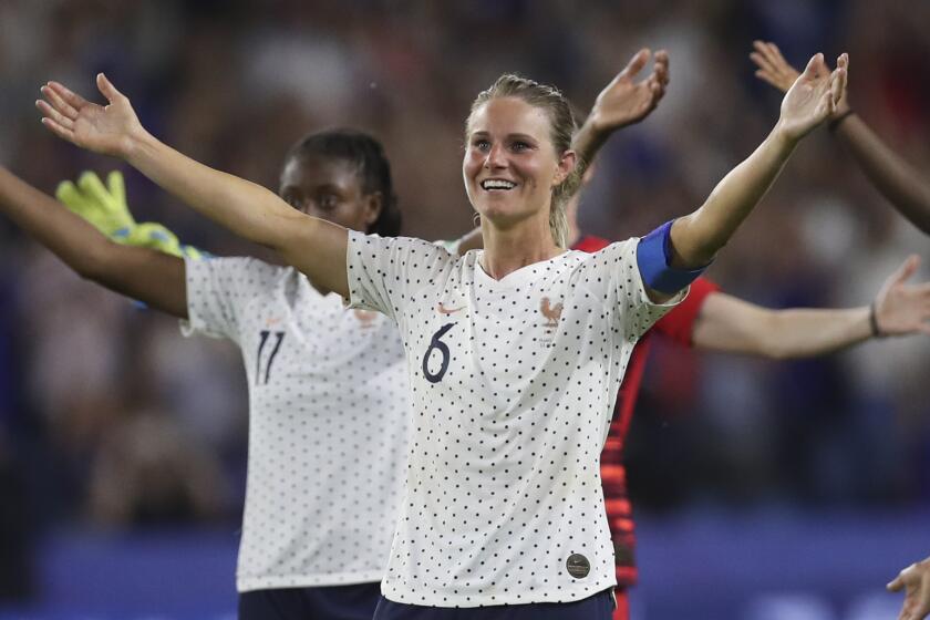 France's Amandine Henry celebrates at the end of a Women's World Cup round of 16 soccer match