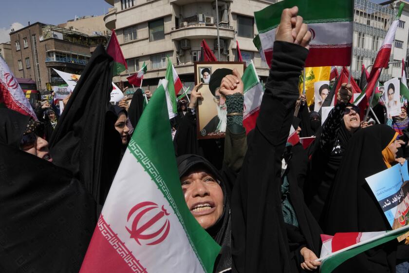 FILE - Iranian worshippers chant slogans during an anti-Israeli gathering after Friday prayers in Tehran, Iran, April 19, 2024. President Joe Biden can breathe a little bit easier with Israel and Iran seemingly stepping back from the brink of plunging the Middle East into all-out war. But challenges across the Middle East are testing the proposition he made to voters during his 2020 campaign: A Biden White House would bring a measure of calm around the globe and renewed respect on the world stage. (AP Photo/Vahid Salemi, File)