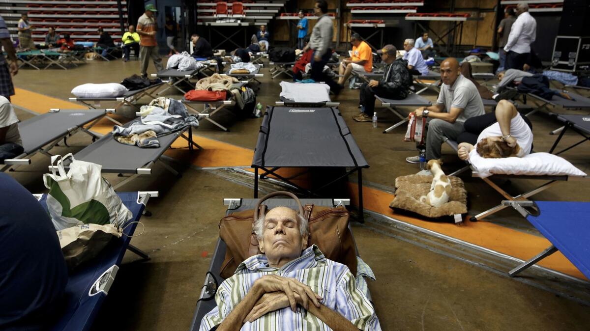 Hundreds of people take shelter at the Roberto Clemente Coliseum in San Juan, Puerto Rico.