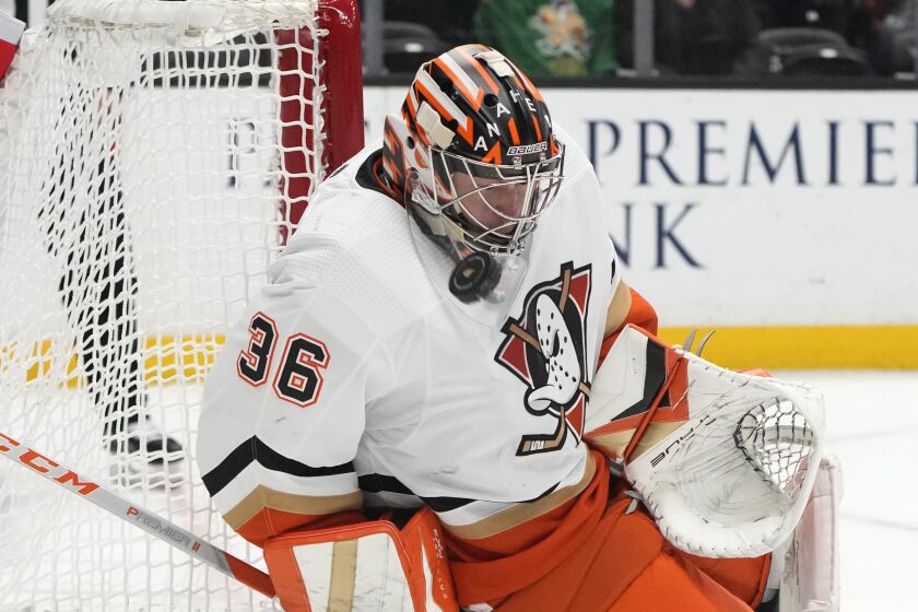 Anaheim Ducks goaltender John Gibson (36) stops a shot during the second period of the team's NHL hockey game against the Detroit Red Wings on Tuesday, Nov. 15, 2022, in Anaheim, Calif. (AP Photo/Marcio Jose Sanchez)
