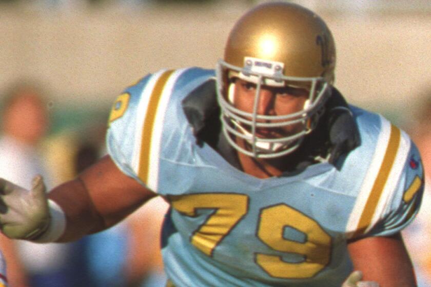 UCLA offensive tackle Jonathan Ogden made the Football Writers Assn. of America's 75th Anniversary All-America team.