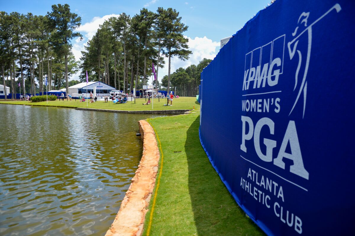 A sign reads "Women's PGA: Atlanta Athletic Club."