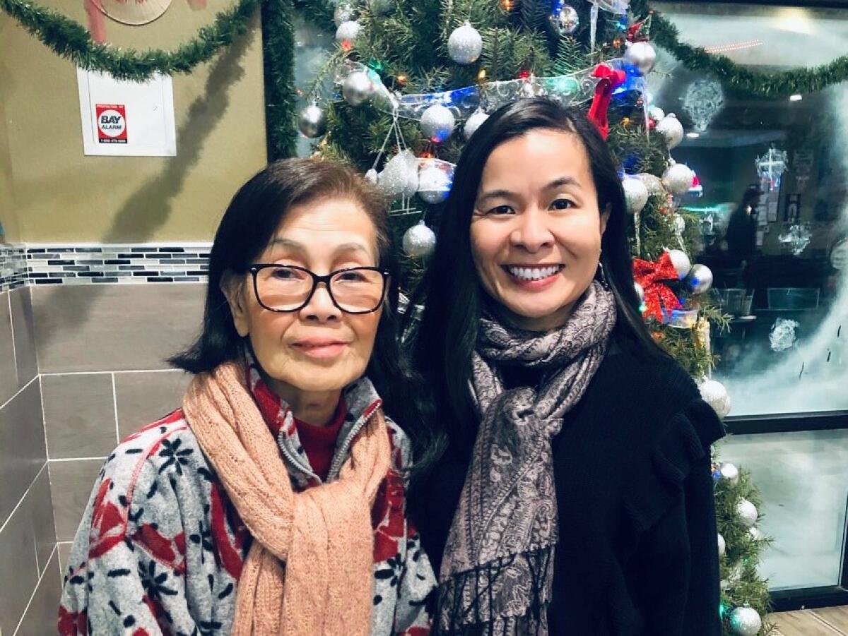Oanh Meyer — pictured with her mother, Anh Le — is an associate adjunct professor at UC Davis.