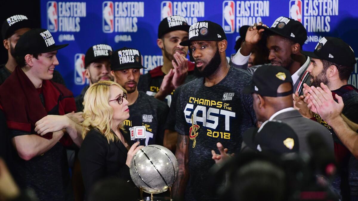 Cleveland's LeBron James is interviewed by ESPN's Doris Burke after the Cavaliers defeated the Boston Celtics in Game 7 of the Eastern conference finals on May 27.