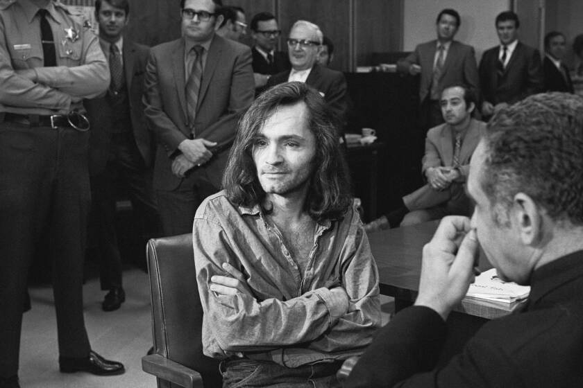Charles Manson opposite his lawyer, Irving Kanarek, at the 1970 trial for the Tate?LaBianca murders. Credit: Bettmann Archive