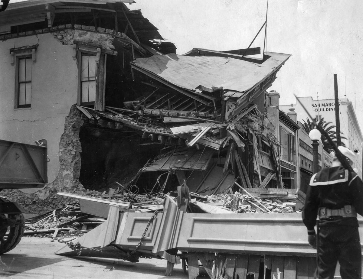 A sailor patrols Long Beach following the March 10, 1933, earthquake.