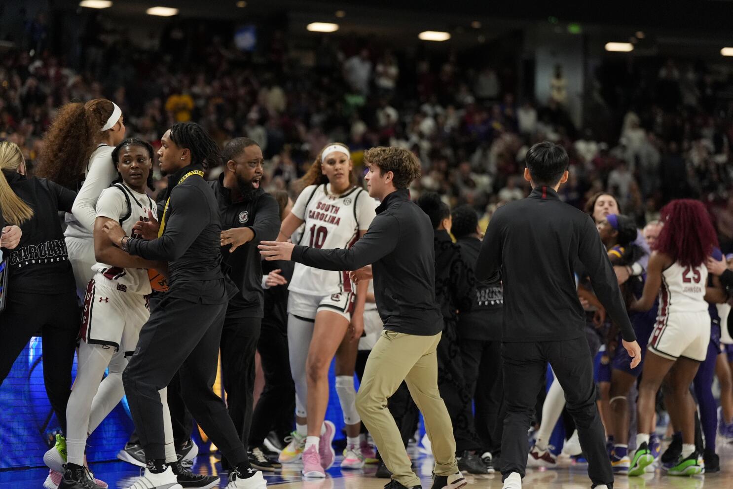 US women's basketball coach hits back at critics condemning her