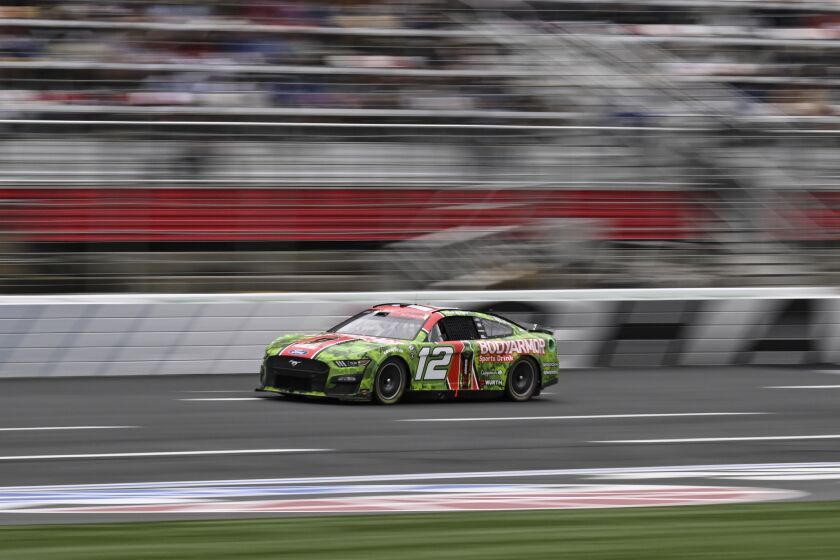 Ryan Blaney (12) competes during a NASCAR Cup Series auto race at Charlotte Motor Speedway, Monday, May 29, 2023, in Concord, N.C. (AP Photo/Matt Kelley)