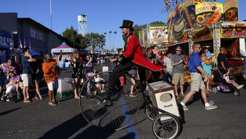 A parade wends though the L.A. County Fair at Fairplex in Pomona on Sept. 2, 2016.