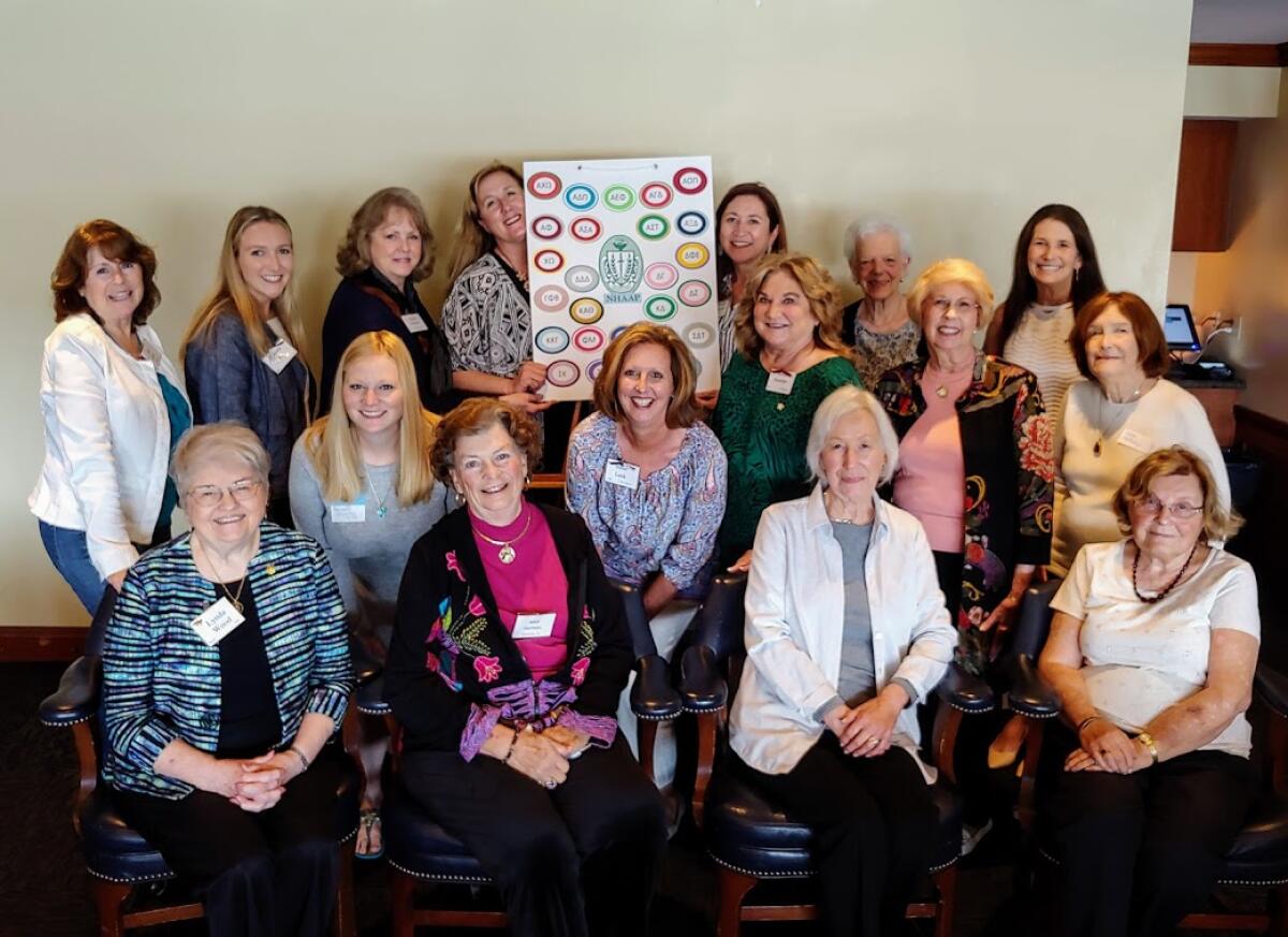 The members of the Newport Harbor Area Alumnae Panhellenic pose for a picture at an April meeting.