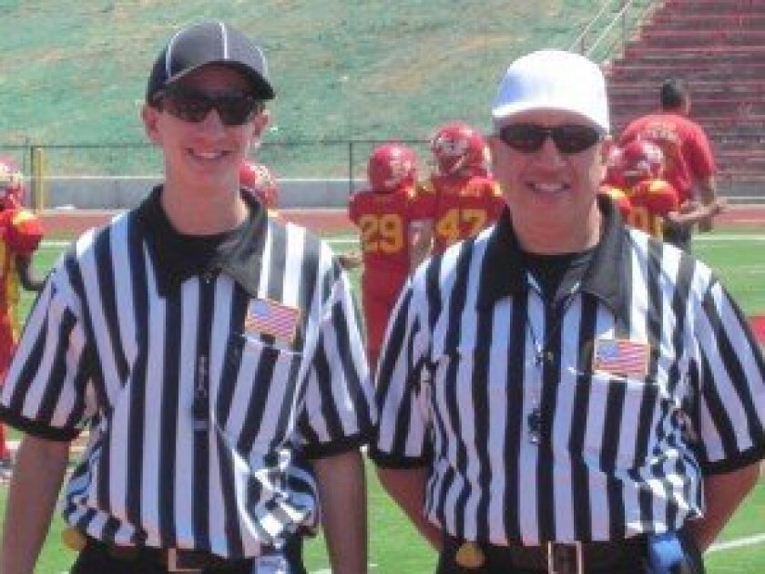 Vincent and Sal Gambino refereed a local football game together.