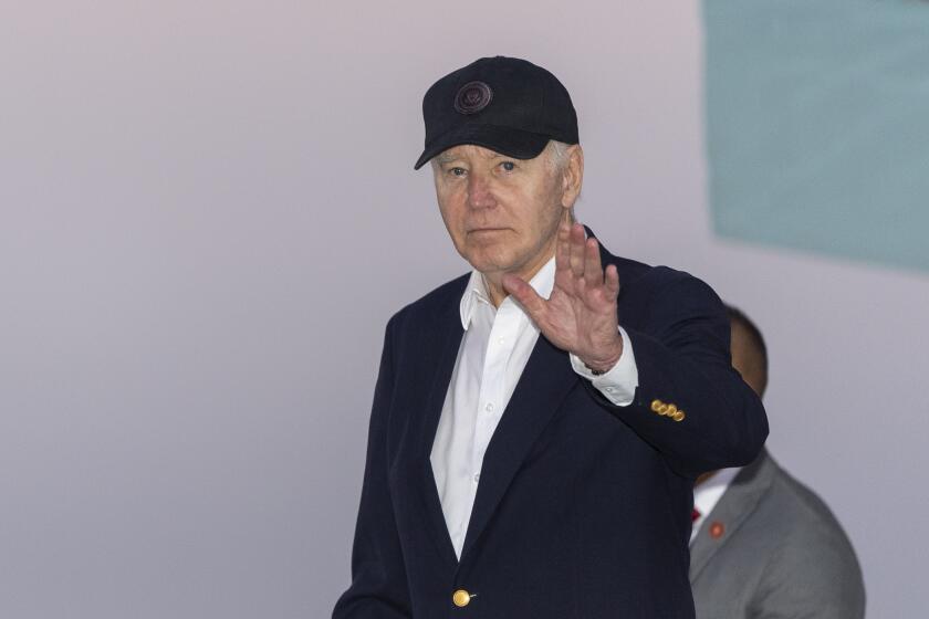 President Joe Biden waves as he arrives on Air Force One, Saturday, June 15, 2024, in Los Angeles. Biden will attend a campaign event Saturday night. (AP Photo/Alex Brandon)