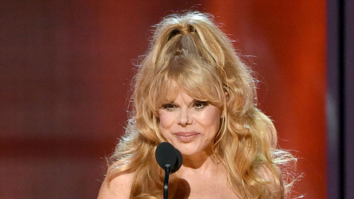 Charo, photographed in 2014, said her husband, Kjell Rasten, has died by suicide.