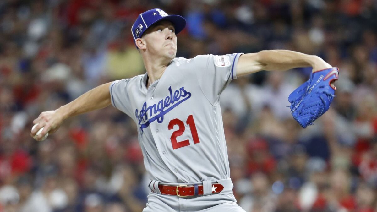 Dodgers starter Walker Buehler pitches during the fifth inning of the MLB All-Star game in Cleveland on Tuesday. Buehler is one of the Dodgers standouts signed by team scout Marty Lamb.
