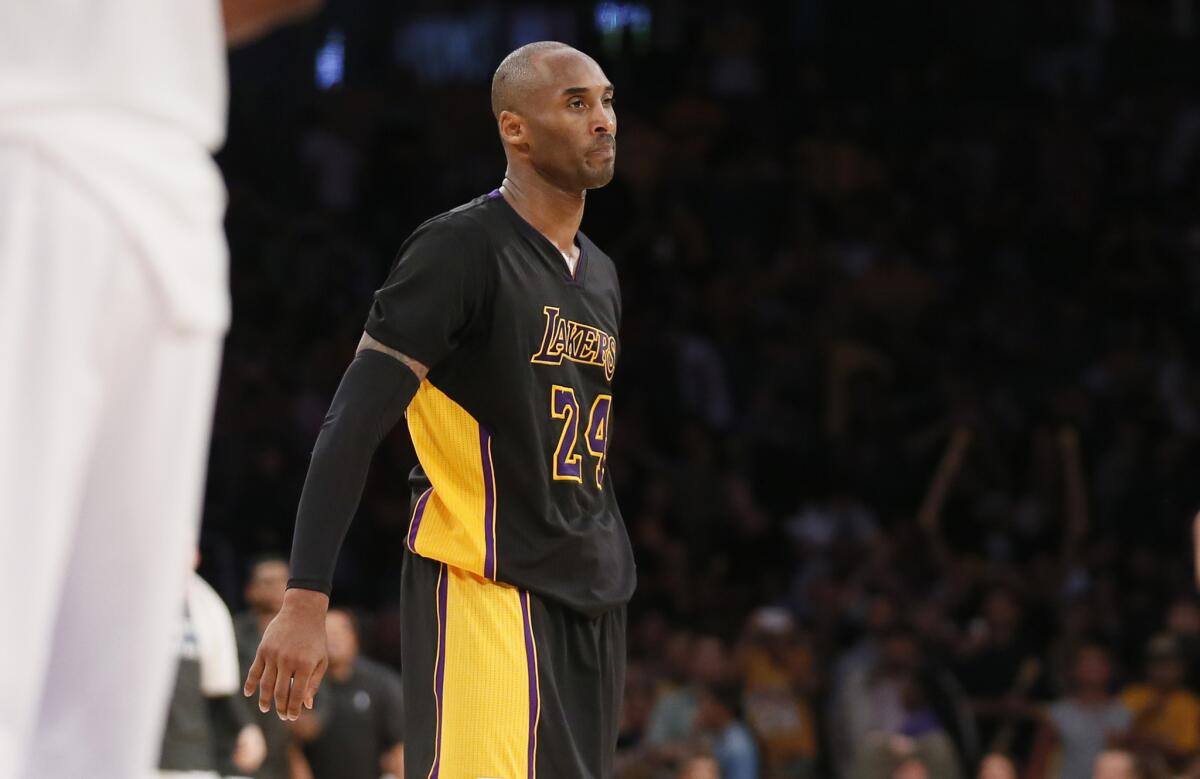 Lakers guard Kobe Bryant reacts after missing the final shot of the game in a 120-119 loss to the Timberwolves.