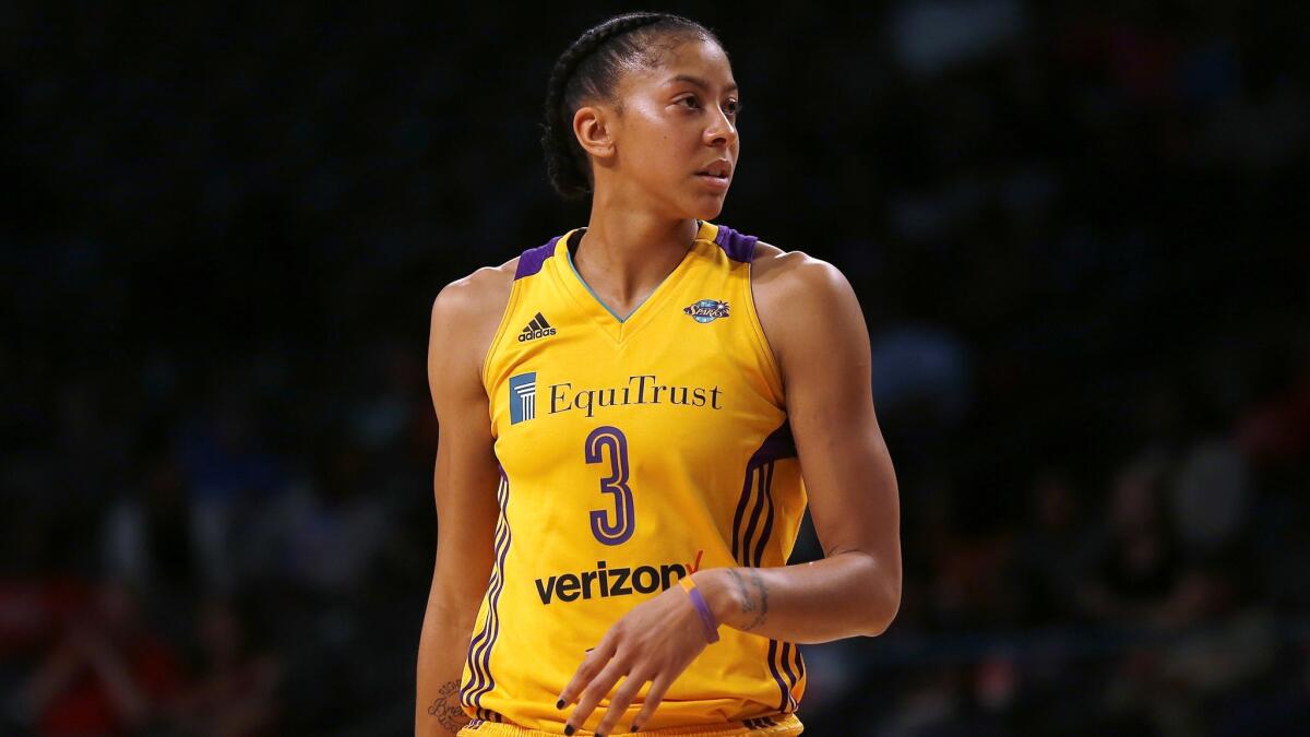 Candace Parker, shown during a game earlier this season, had 23 points and 10 rebounds in the Sparks' win Sunday.