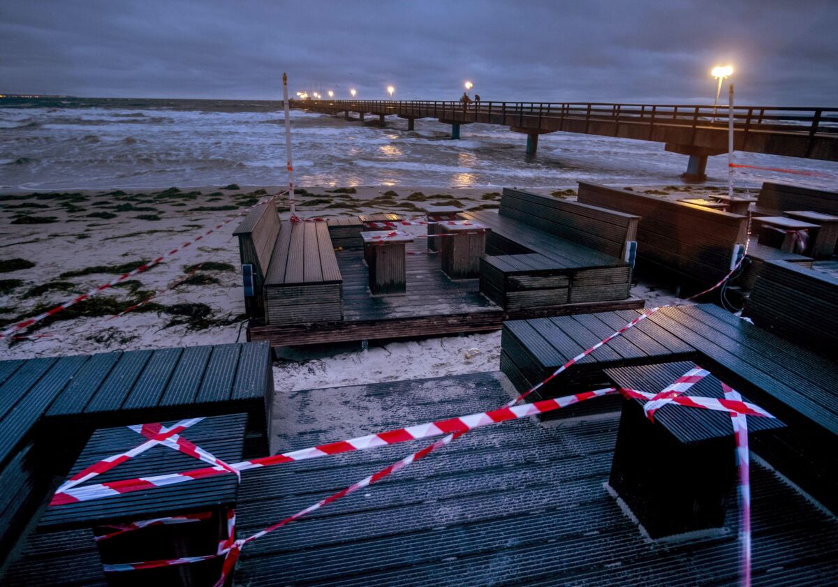 A beach bar is closed due to the lockdown at the pier in Scharbeutz, northern Germany, Tuesday, Jan. 5, 2021. German government will discuss further restrictions to avoid the outspread of the Coronavirus. (AP Photo/Michael Probst)