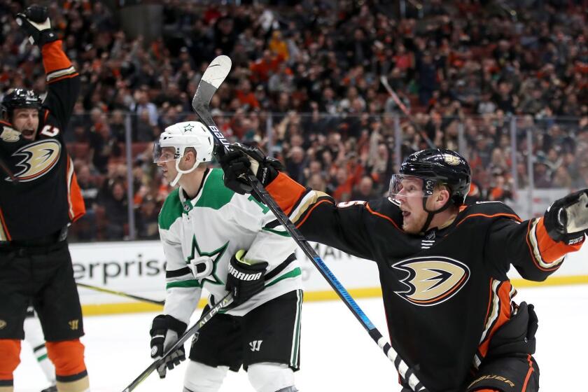 ANAHEIM, CA - DECEMBER 12: Ryan Getzlaf #15 reacts to a goal by Ondrej Kase #25 of the Anaheim Ducks against the Dallas Stars Blake Comeau #15 of the Dallas Stars looks on during the third period of a game at Honda Center on December 12, 2018 in Anaheim, California. (Photo by Sean M. Haffey/Getty Images) ** OUTS - ELSENT, FPG, CM - OUTS * NM, PH, VA if sourced by CT, LA or MoD **