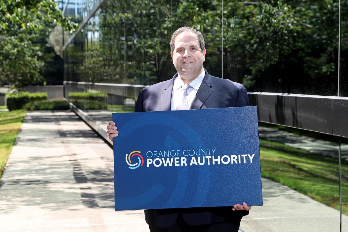 Brian Probolsky, Orange County Power Authority chief executive, poses for a portrait outside of his office in Irvine.