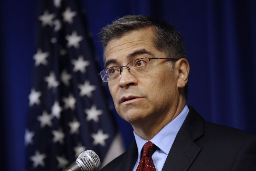 FILE - In this Dec. 4, 2019, file photo, California Attorney General Xavier Becerra speaks during a news conference in Sacramento, Calif. Becerra has sued the state Republican Party and wants to know the names and contact information of every voter who has put a ballot in one of the Republican Party's unofficial ballot drop boxes. (AP Photo/Rich Pedroncelli, File)