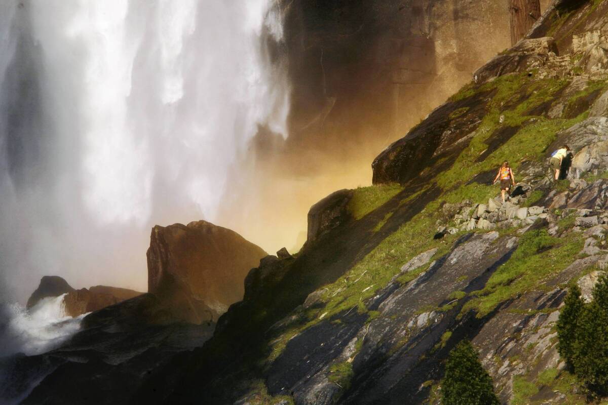 Vernal Fall is one of Yosemite National Park's most popular spots. A summer day can see 2,000 visitors. Above, hikers make their way up the Mist Trail leading to the top of Vernal Fall in 2009.