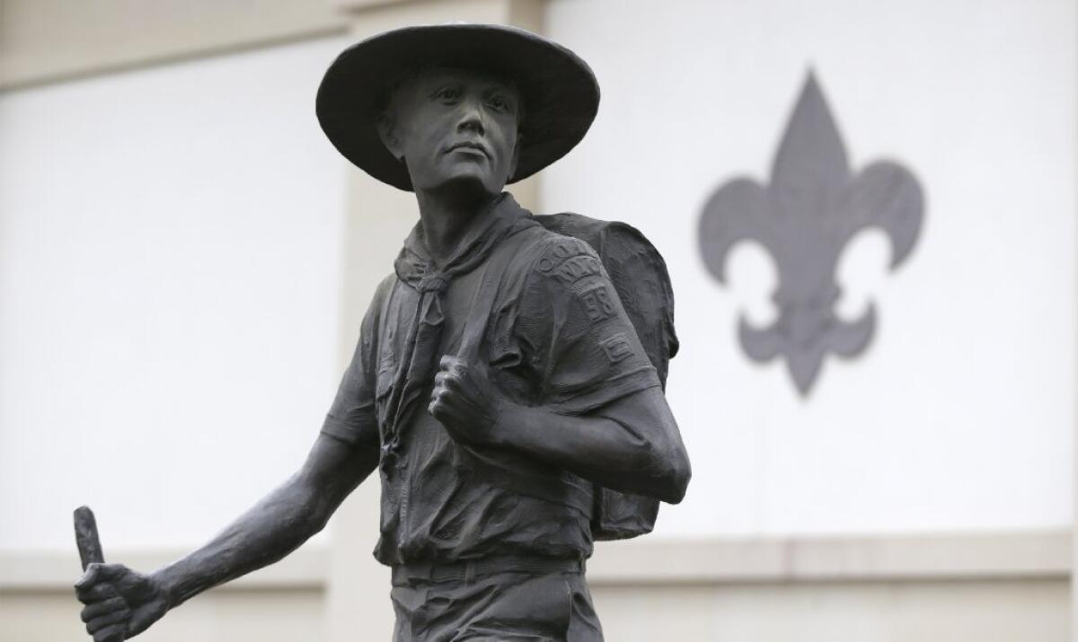 A statue of a Boy Scout stands in front of the National Scouting Museum in Irving, Texas. "Are we in California in the business of paying for discrimination?" Sen. Ricardo Lara (D-Bell Gardens) asked his colleagues. "I don't think we are."