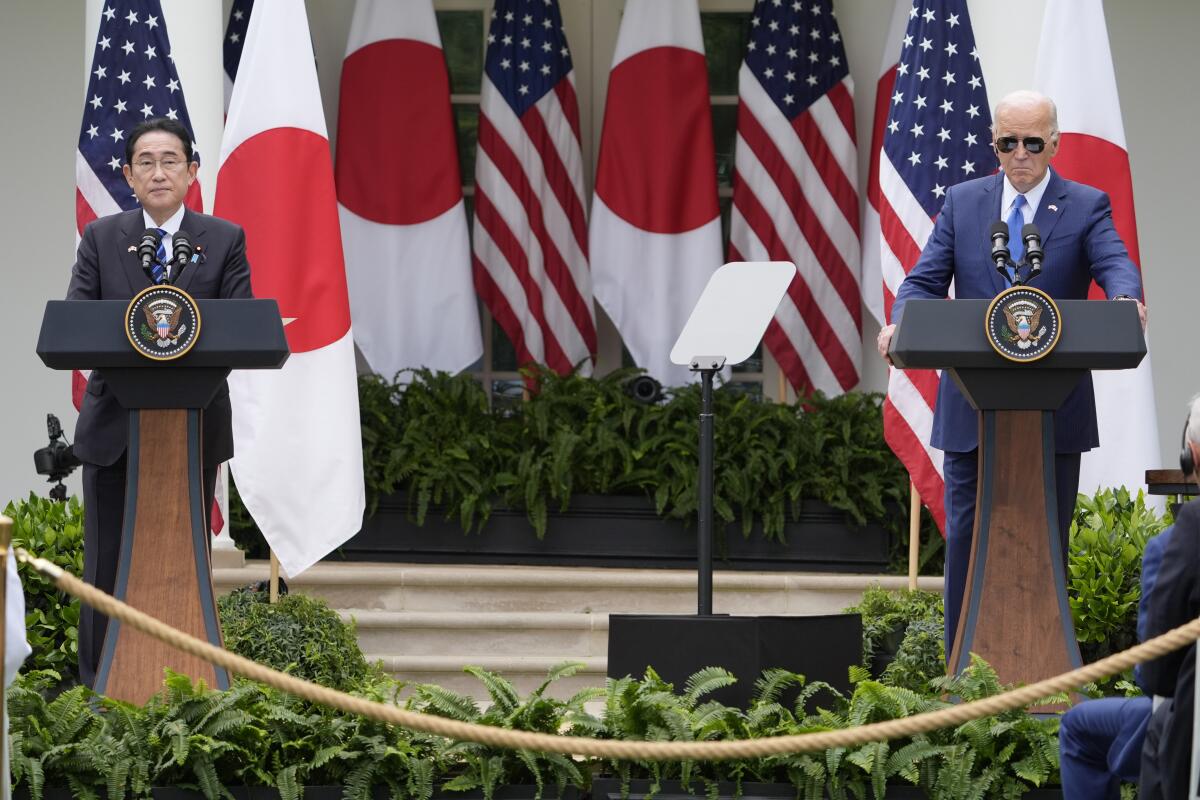 President Biden and Japanese Prime Minister Fumio Kishida participate in a news conference.