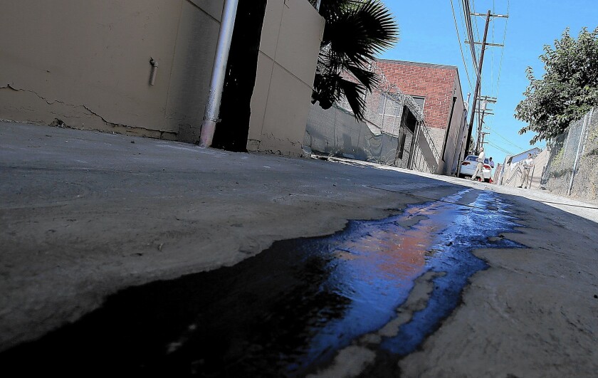 Water runoff flows in the Temple-Beaudry neighborhood of Los Angeles.