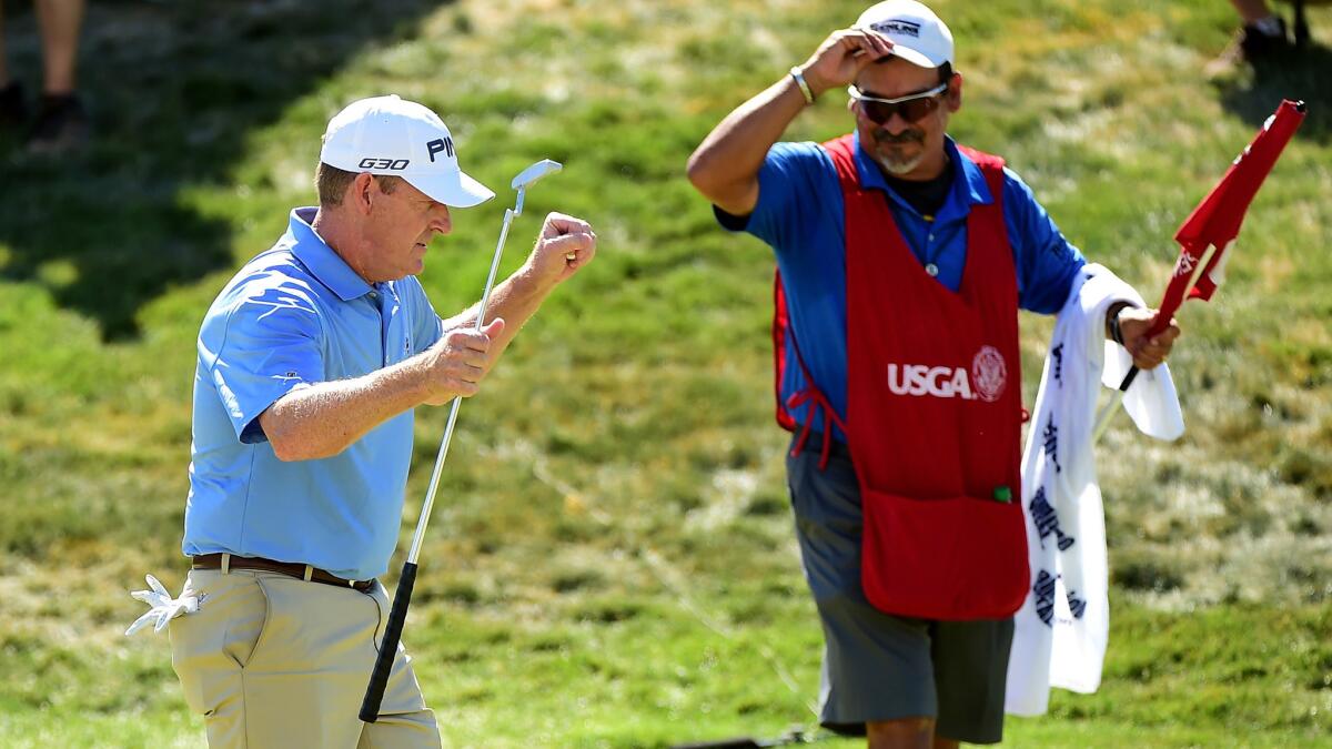 Jeff Maggert reacts after sinking the final putt to win the U.S. Senior Open on Sunday in Sacramento.