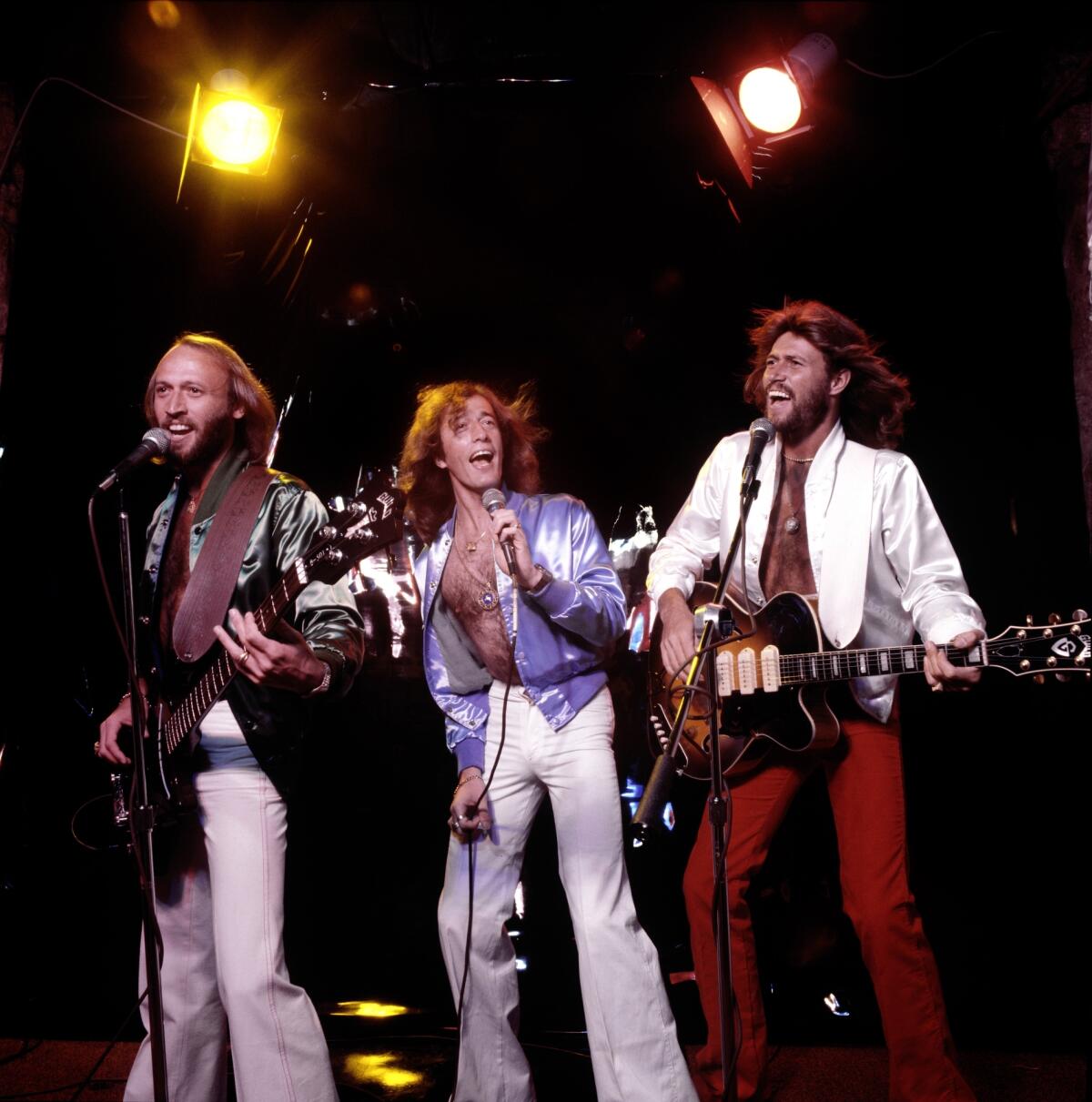 Maurice, Robin and Barry Gibb of the Bee Gees, performing onstage in 1979.
