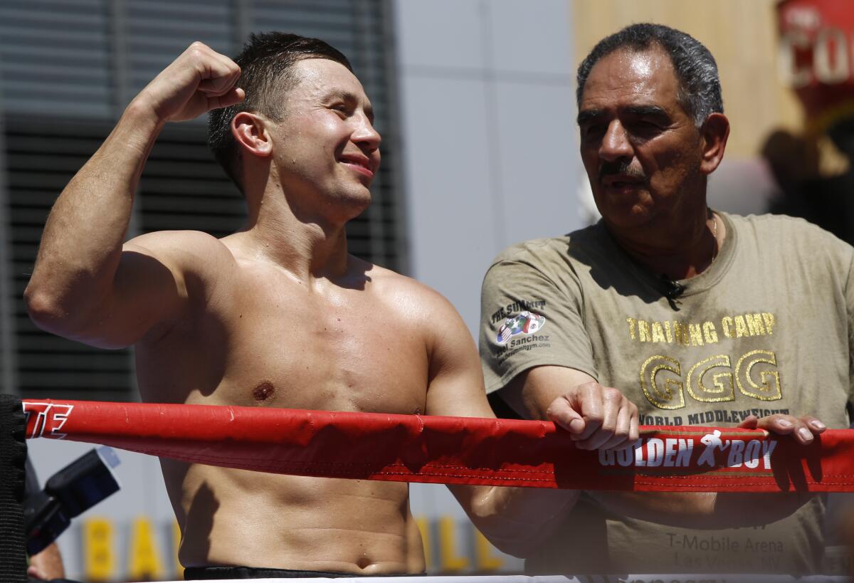 Boxer Middleweight Champion Gennady "GGG" Golovkin, left, and his coach Abel Sanchez host an open-to-the-public media workout at L.A. LIVE in Los Angeles on Monday, Aug. 28, 2017. Canelo Alvarez vs. Gennady "GGG" Golovkin is a 12-round box fight for the middleweight championship of the world presented by Golden Boy Promotions and GGG Promotions. The event will take place Saturday, Sept. 16, 2017, at T-Mobile Arena in Las Vegas.