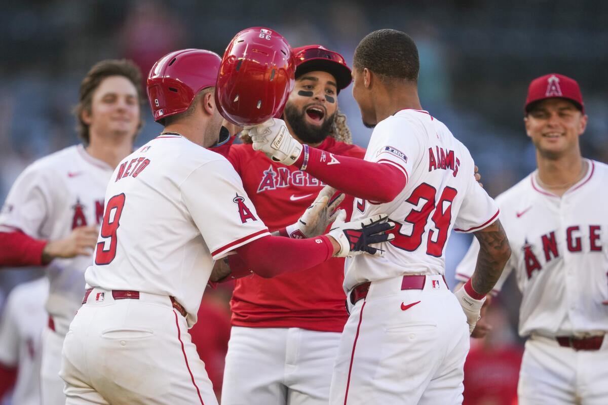 Los Angeles Angels' Jordyn Adams (39) celebrates after a walk-off single during the thirteenth inning.