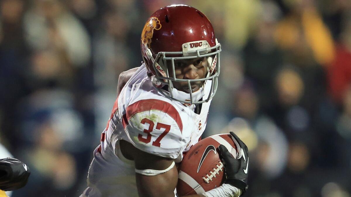 USC running back Javorius Allen carries the ball during a win over Colorado in November 2013.