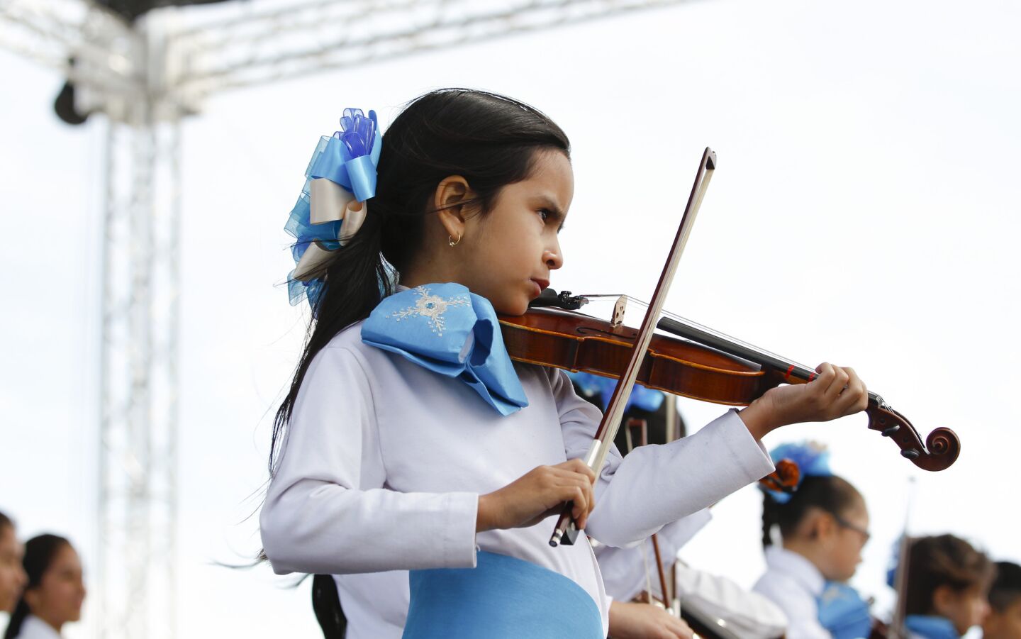A young girl from National City School District, grades 1 through 8 performed at the annual International Mariachi Festival in National City.