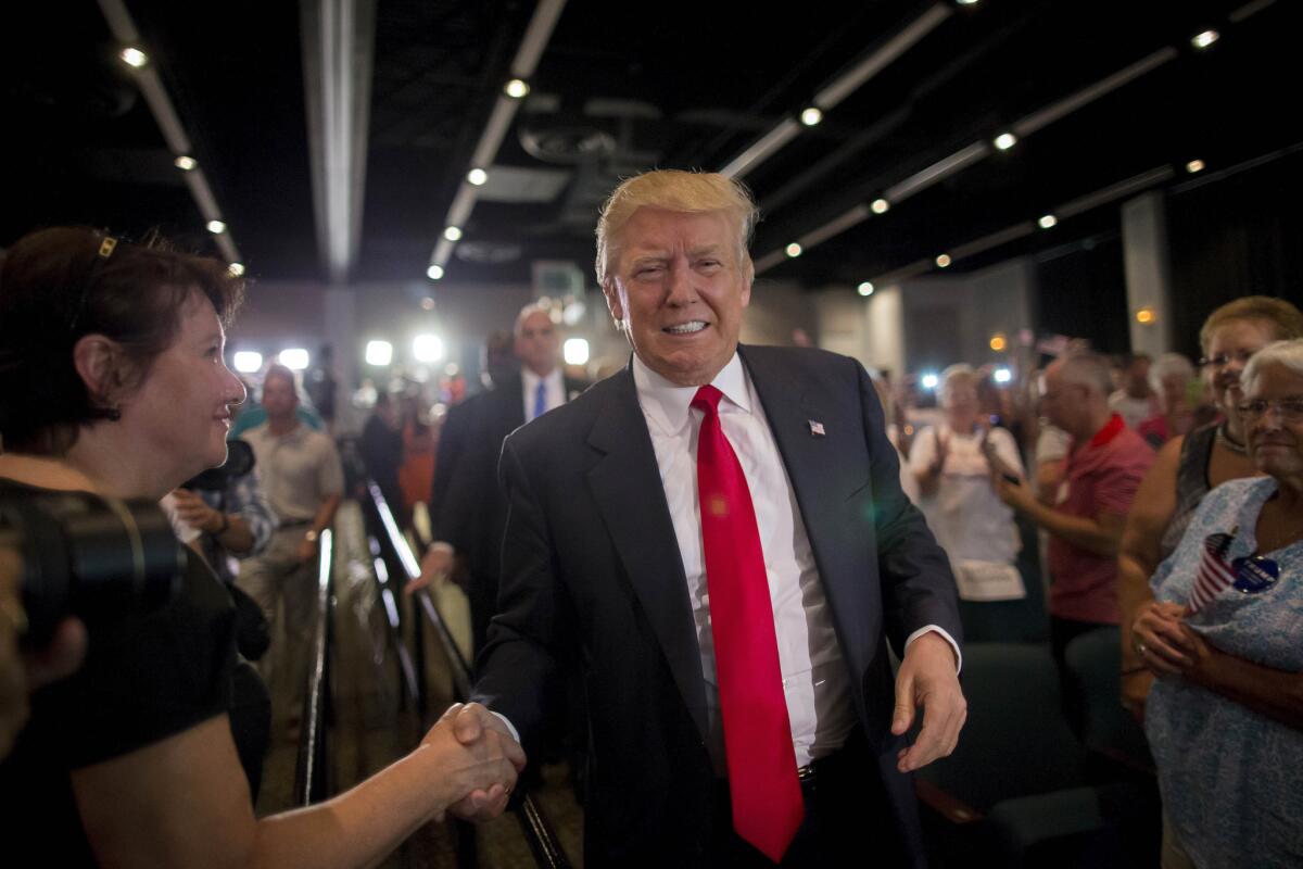 Republican presidential candidate Donald Trump, shown this week in South Carolina, visited Laredo, Texas, on Thursday, where he was greeted by protesters.