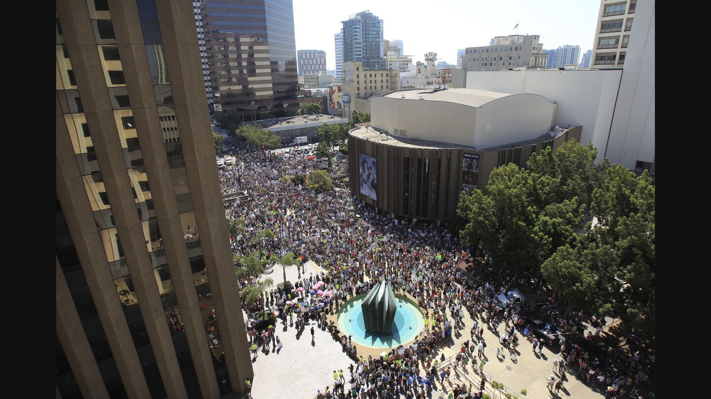 Thousands of people fill the Civic Center Plaza as they gather for the March for Science.