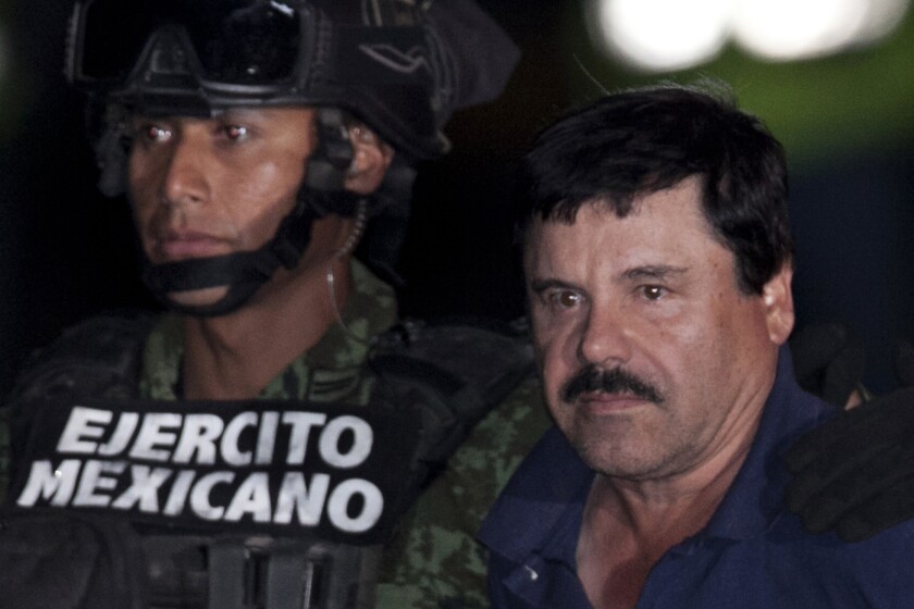 A Chicago man has been sentenced to eight years in prison for laundering money for drug lord Joaquin "El Chapo" Guzman, pictured here during his arrest in January in Mexico.