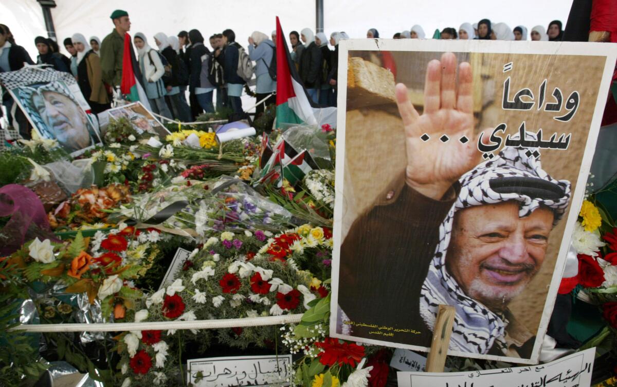 Palestinian leader Yasser Arafat, who died nine years ago at a Paris hospital after exhibiting symptoms doctors thought to be from influenza, was probably poisoned by the radioactive isotope polonium-210, Swiss forensic scientists have concluded in a report released Wednesday.